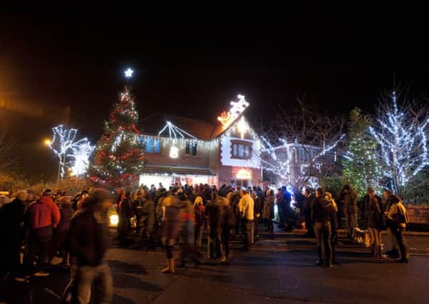 Photo Ian Robinson
The Tipping Family Christmas lights switch at their home on Valentines Meadow in Cottam