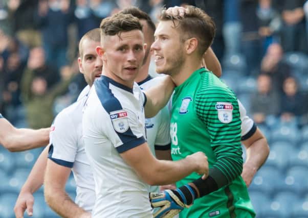 Chris Maxwell is congratulated on his penalty save against Aston Villa