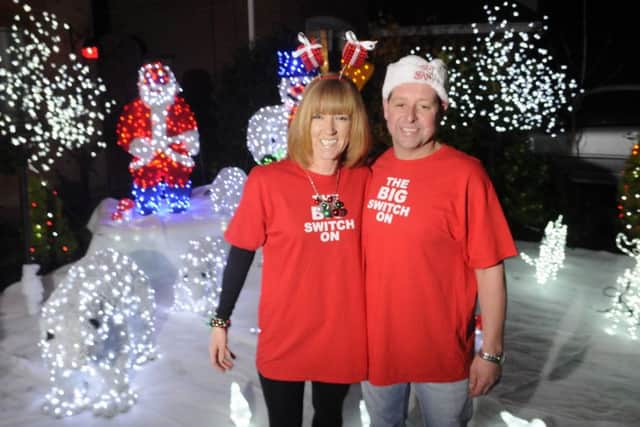 Charity Christmas house lights switch-on in Cottam.  Pictured are Mark and Nicola Tipping.