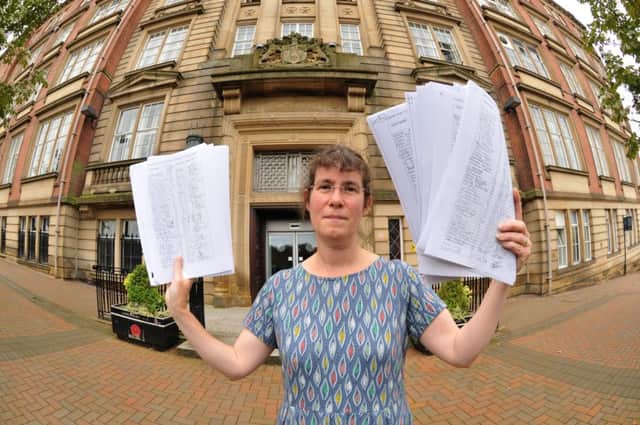 Library campaigner Jane Porter at County Hall with a petition to save Fulwood Library