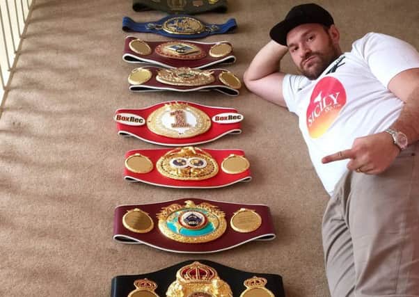 Tyson Fury posted this picture on Twitter shortly before vacating his world titles.