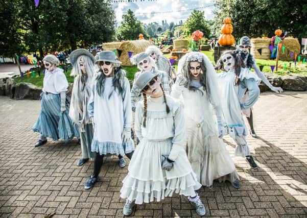 Guests are welcomed by an army of ghostly beauties