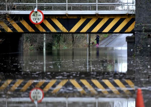 Photo Neil Cross
The railway bridge at Euxton that has become an interent hit since the floods