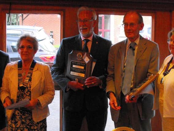 Past President Lion Derek Westall, current President Lion Dorothy Livesey, Roy Clayton, John Hex and district governor Sue Tyson who presented the awards at Leyland Lions charter anniversary dinner