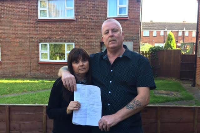 Steve De-haan with his wife Irene and the letter he was given telling him he was free from cancer in February