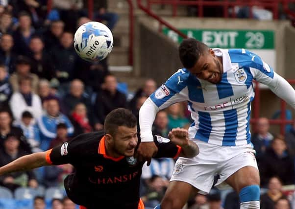 Huddersfield striker Elias Kachunga in action