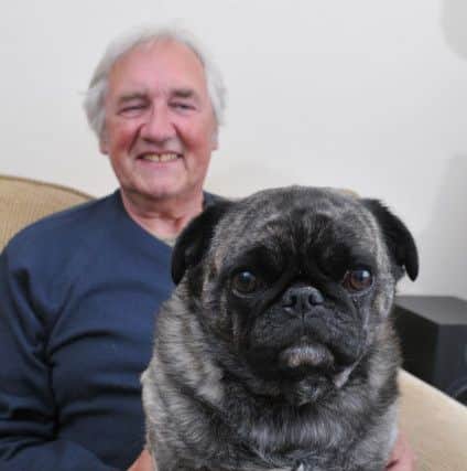 Photo Neil Cross
Ray Panzer, of Fulwood, in remission from prostate cancer, with Dolly the Frug