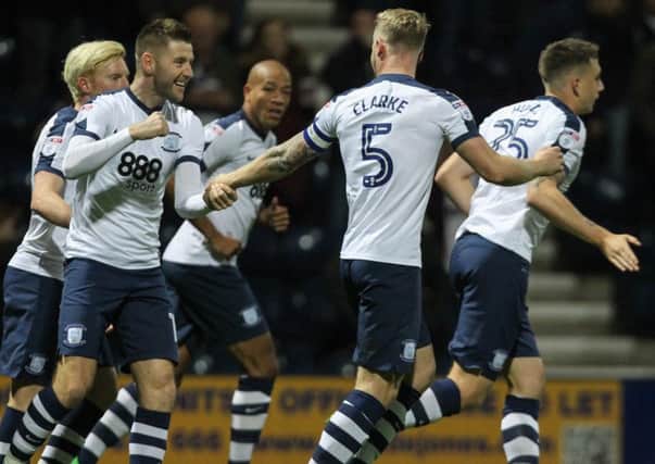 Preston North End celebrate their opening goal against Huddersfield.