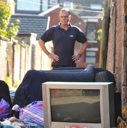 Photo Neil CrossKenny Deverson got so sick of fly-tipping and rats in the alley behind his house, in Ribbleton, he's taken matters into his own hands and sorted it himselfKenny with rubbish in a nearby alley