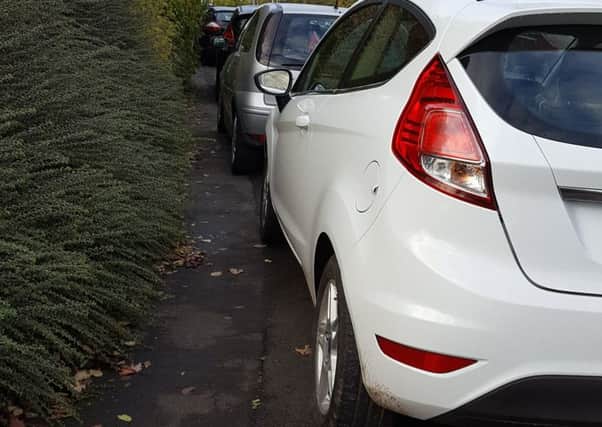 A reader is concerned about cars parking along Olivers Place, Fulwood. See main letter