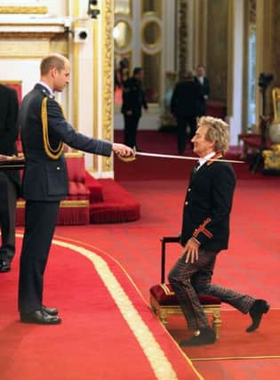 Rod Stewart is knighted by the Duke of Cambridge at Buckingham Palace. See letter below