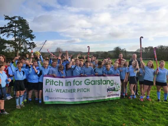 Pupils supporting the Pitch In campaign for a new multi-sports pitch at Garstang Community Academy