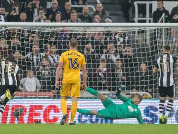 Matt Ritchie fires in Newcastle's third from the penalty spot.