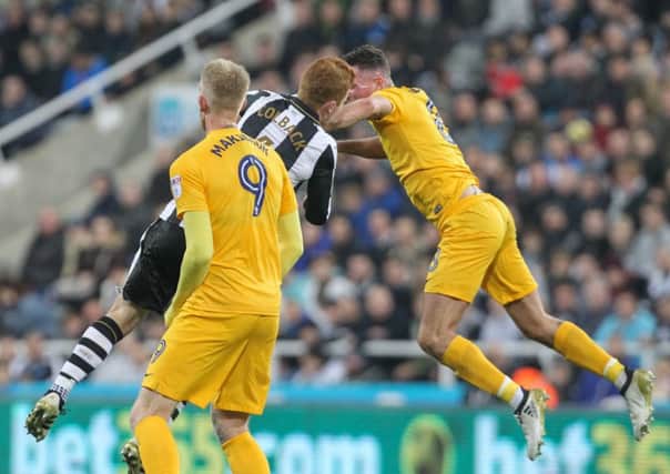Alan Browne clatters into Jack Colback, that earning the PNE man a red card