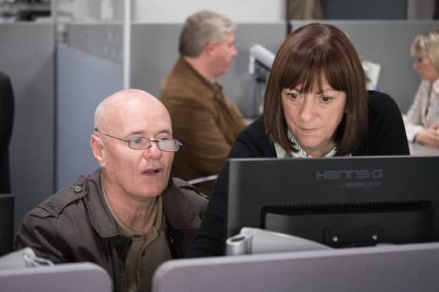 Kate Rutter with Dave Johns in a scene from I, Daniel Blake. See letter