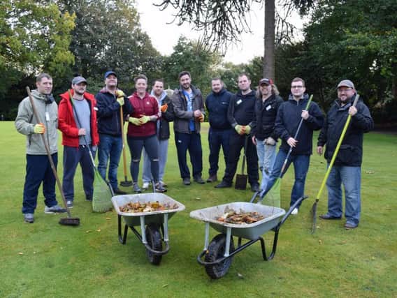 Staff from Vodafone volunteered in the grounds of St Catherines Hospice and in the charitys onsite cafe, The Mill