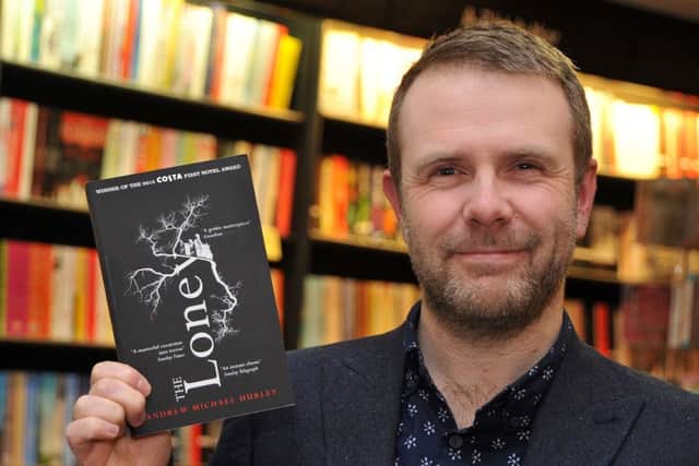 Former librarian Andrew Michael Hurley returned to Waterstones in his home town of Preston to give a talk and sign copies of his Costa First Novel Award winning book The Loney.
Andrew with his book.  PIC BY ROB LOCK
3-2-2016