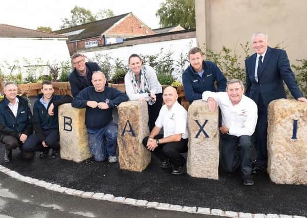Front row: Baxi employees Mike Baines, Dan Richardson, Leo Billington, Peter West, Peter Mitchinson.
Back row: South Ribble Borough Council Community Works Manager Howerd Booth, Baxis Ashlea Arnold, Baxis Nigel Pickles, and South Ribble Borough Councillor Phil Smith.