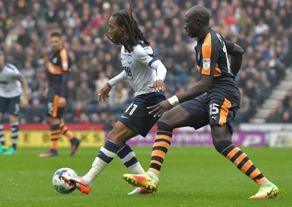 Daniel Johnson shields the ball from Newcastle's Mohamed Diame