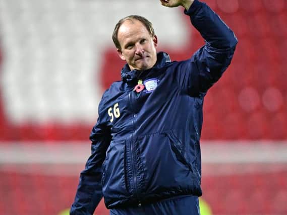 Simon Grayson salutes the PNE fans at the final whistle at Rotherham