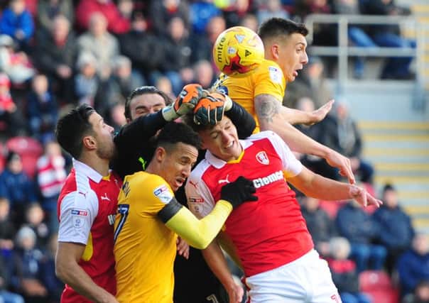 Callum Robinson (left) and Jordan Hugill in the thick of things at the New York Stadium