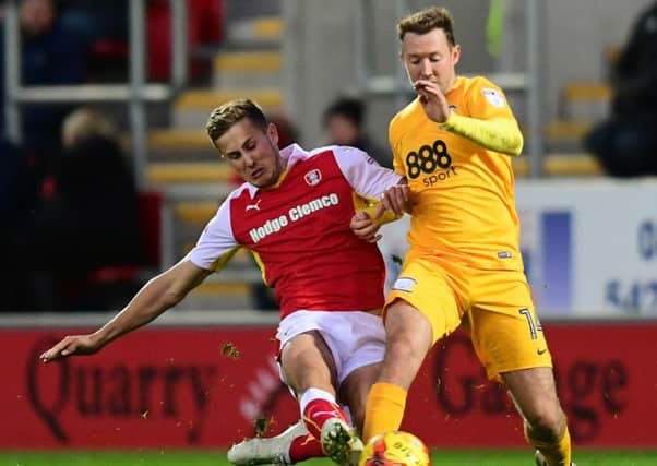Aiden McGeady is tackled by Rotherham United's Will Vaulks.