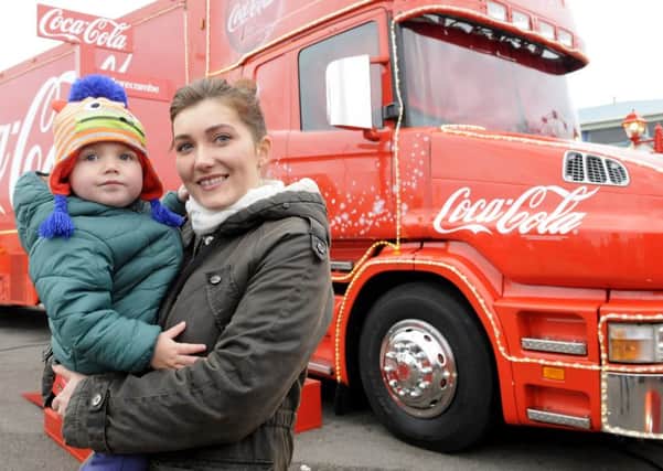 The Coca-Cola Christmas truck was in Morecambe in 2014 and 2015.  Here is Aleksandra Szlachetka with son Aleksander Tylicki with the truck in 2014.