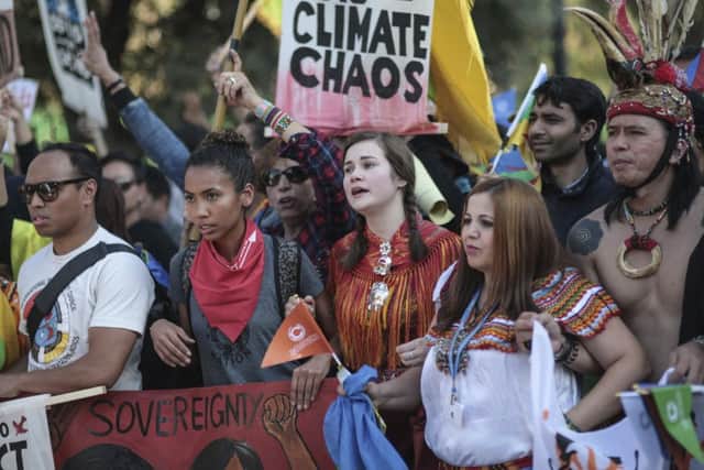 Hundreds protest against climate change in a march coinciding with the Climate Conference in Marrakech, Morocco