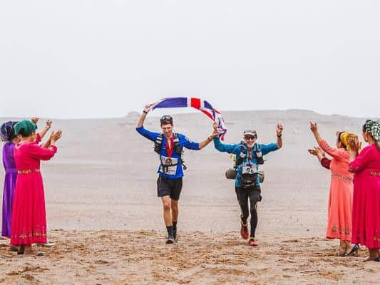 Mike Thompson and his son Dean in the Gobi Desert