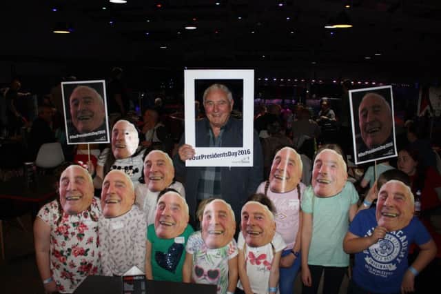 Everyone wore masks of Terry Jackson, president of Recycling Lives, for their own Presidents Day