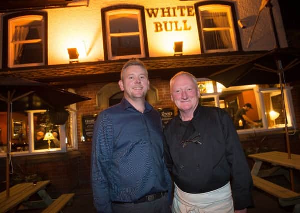 Publican Keith Senior and chef Ian Senior celebrate  the relaunch of the White Bull in Great Eccleston