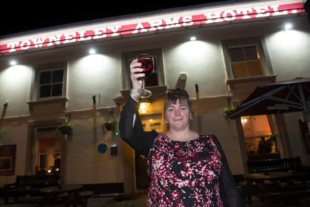Towneley Arms publican Charlotte Horobin celebrates the  refurb at  the  Longridge pub.