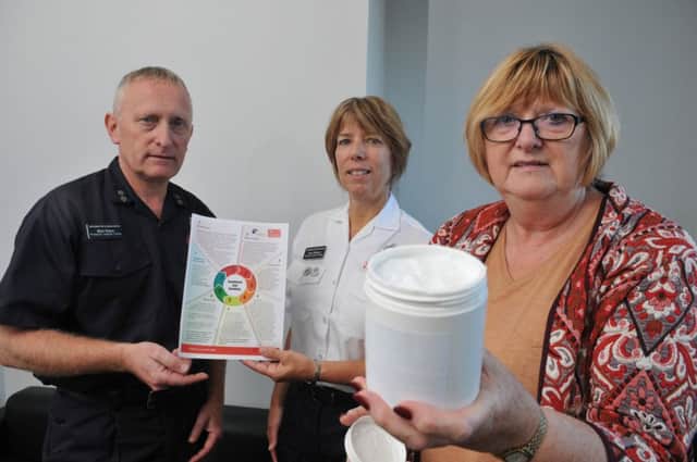 Jane Booth, Chair of the Lancashire Safeguarding Adults Board and the Lancashire Safeguarding Children Board and  Mick Dears and Jane Williams of Lancashire Fire & Rescue alert the public to the potential fire risk