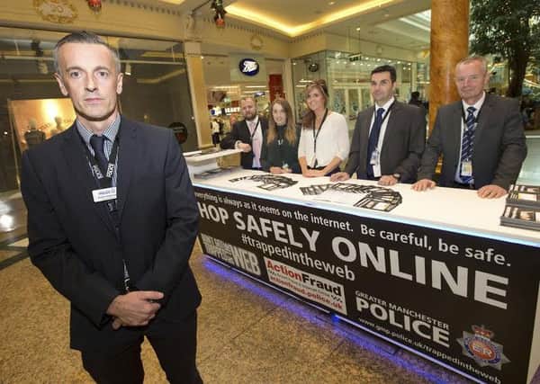 Detective Inspector Martin Hopkinson, of the Serious Crime Division, and the cyber crime fraud team