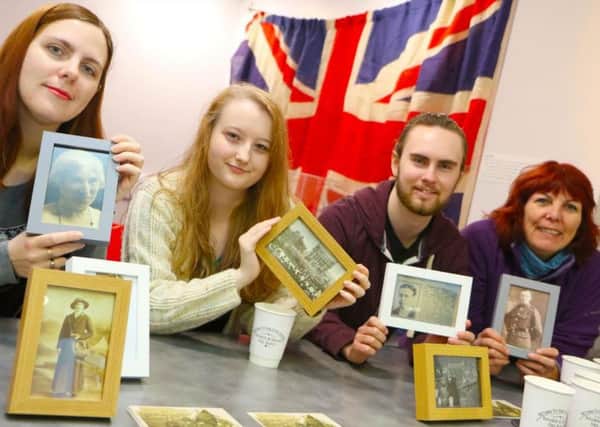 UCLan history students Miriam Kohler, Sarah Pearson and Connor Gillespie who created The Great War Pop-Up Museum with senior enterprise and employability lecturer Gaynor Wood.