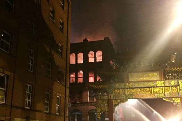 Two bodies have been found after a fire in Manchester's Chinatown