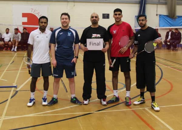 Competition organiser Mohammed Kabir Sharif with the finalists
