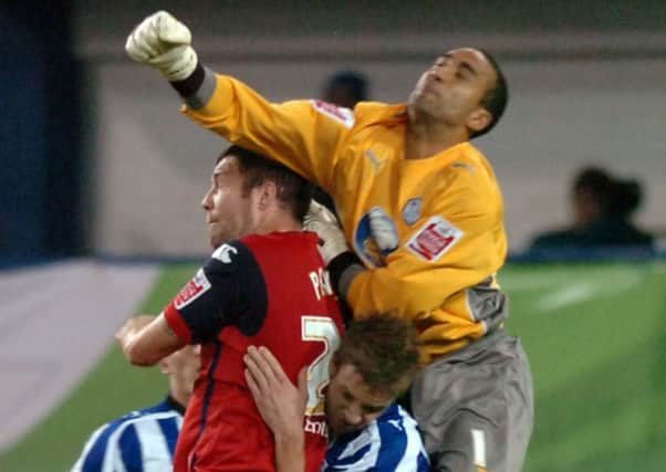 Jon Parkin in the thick of the action during Preston's 2-1 win at Sheffield Wednesday in 2009