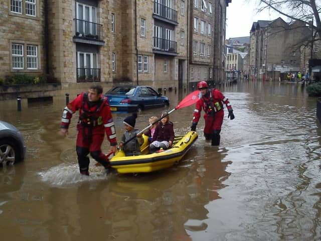 Susan Millward sent this photo of firemen giving her children a ride whilst evacuating the flats on lower St Georges Quay on Sunday.