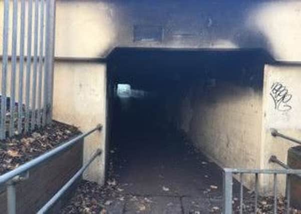 DARKNESS: The blackened underpass which parents and children use on the school run