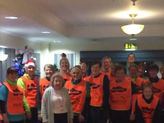 Alison Evans and South Ribble Runners lead a run with residents of The Grange Assisted Living