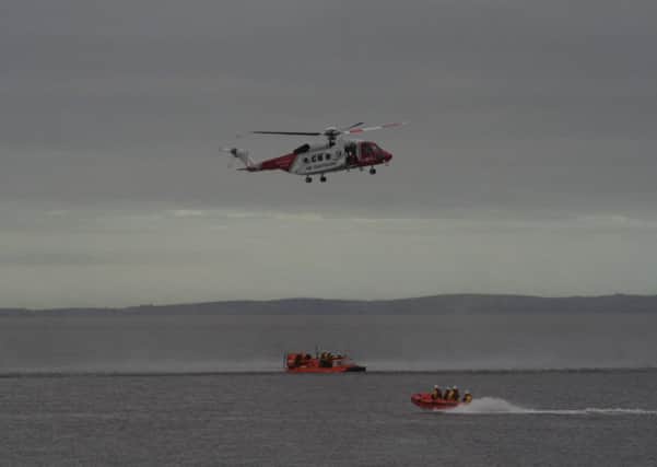 Morecambe's RNLI lifeboat and hovercraft took part in an exercise with the Coastguard helicopter.