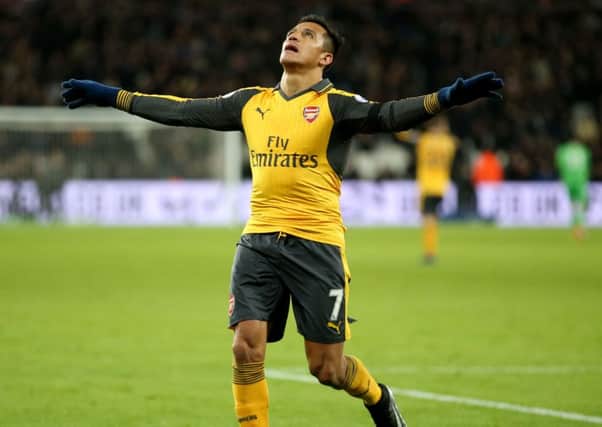 Arsenal's Alexis Sanchez could be facing PNE. Pic by  Steven Paston/PA Wire.