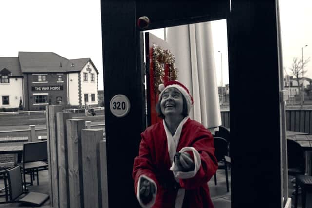 Buckshaw Village Church advent door juggling Santa
