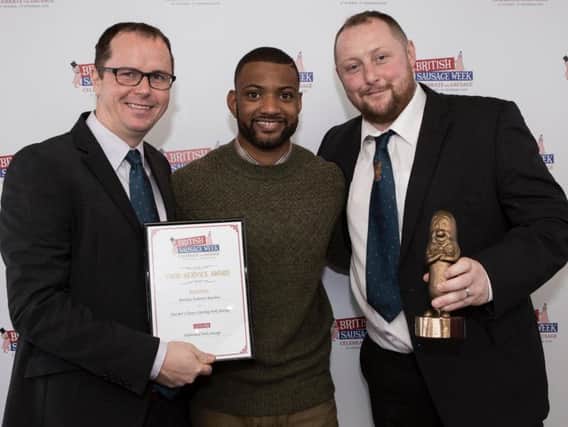 Austin and Roger Anderton, with Jonathan Benjamin (JB) Gill, former member of JLS, who is now the ambassador for British Sausage Week