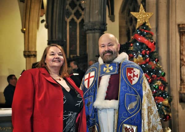 Post editor Gillian Parkinson with Fr Timothy Lipscomb at last year's service
