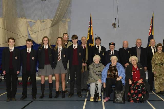 Former Longridge Legion members of the mens and womens section with Rev John Ball and Longridge High School headteacher Jane Green, pupils and cadets at the ceremony
