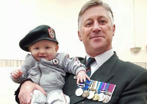 Former soldier Steve Mawer, who had Guillain-Barre syndrome.
With grandson Joshua