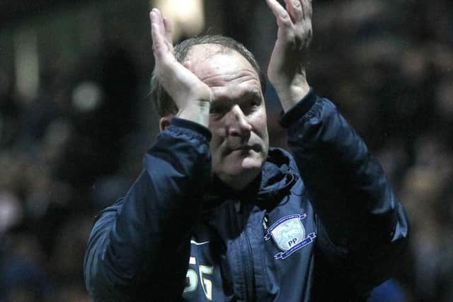 Simon Grayson salutes the Preston fans after the final whistle against Blackburn