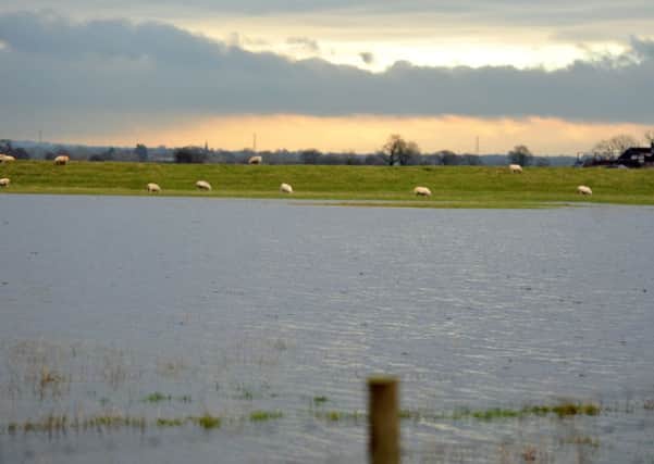 Flooding near Inskip, after Storm Desmond caused the River Wyre to breach its embankment